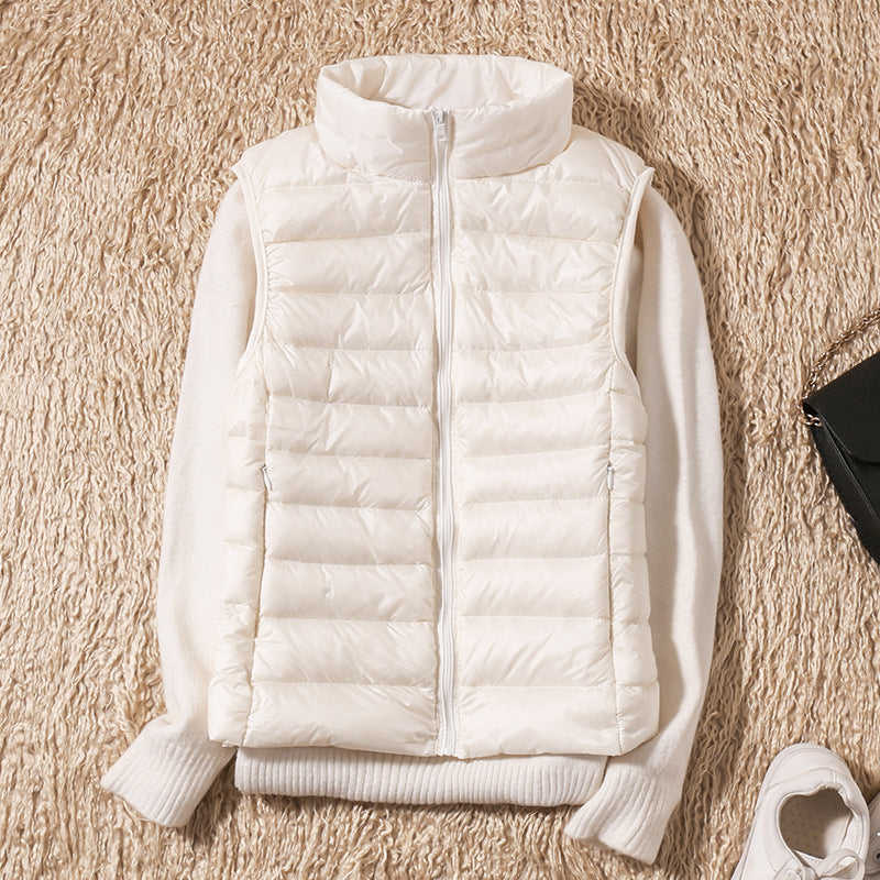 Amira™ | Lichtgewicht donsbodywarmer met plooidetail