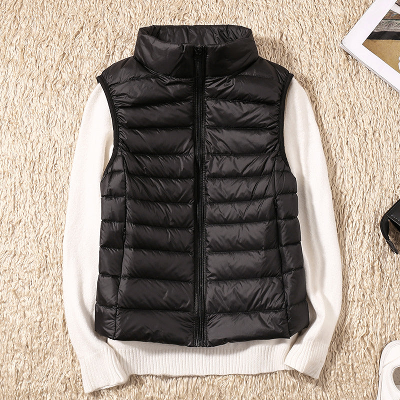 Amira™ | Lichtgewicht donsbodywarmer met plooidetail