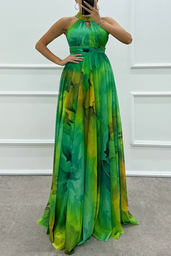 Elaine™ | Tule maxi-jurk met bloemenprint, uitsparingen en halternek