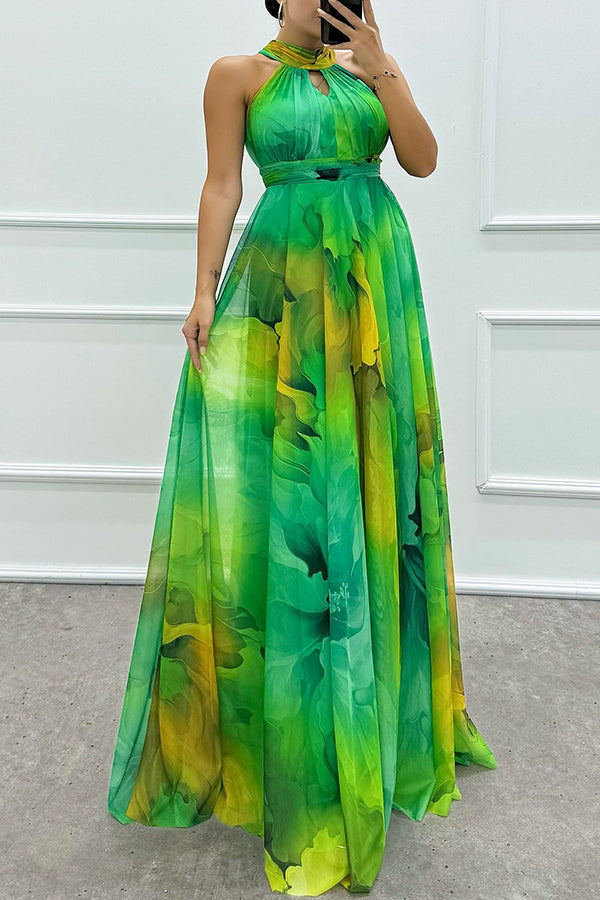 Elaine™ | Tule maxi-jurk met bloemenprint, uitsparingen en halternek