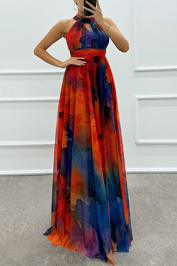 Elaine™ | Tule maxi-jurk met bloemenprint, uitsparingen en halternek