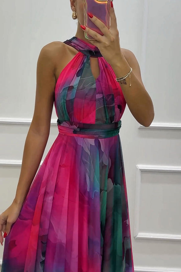 Elaine™ | Tule maxi-jurk met bloemenprint, uitsparingen en halternek
